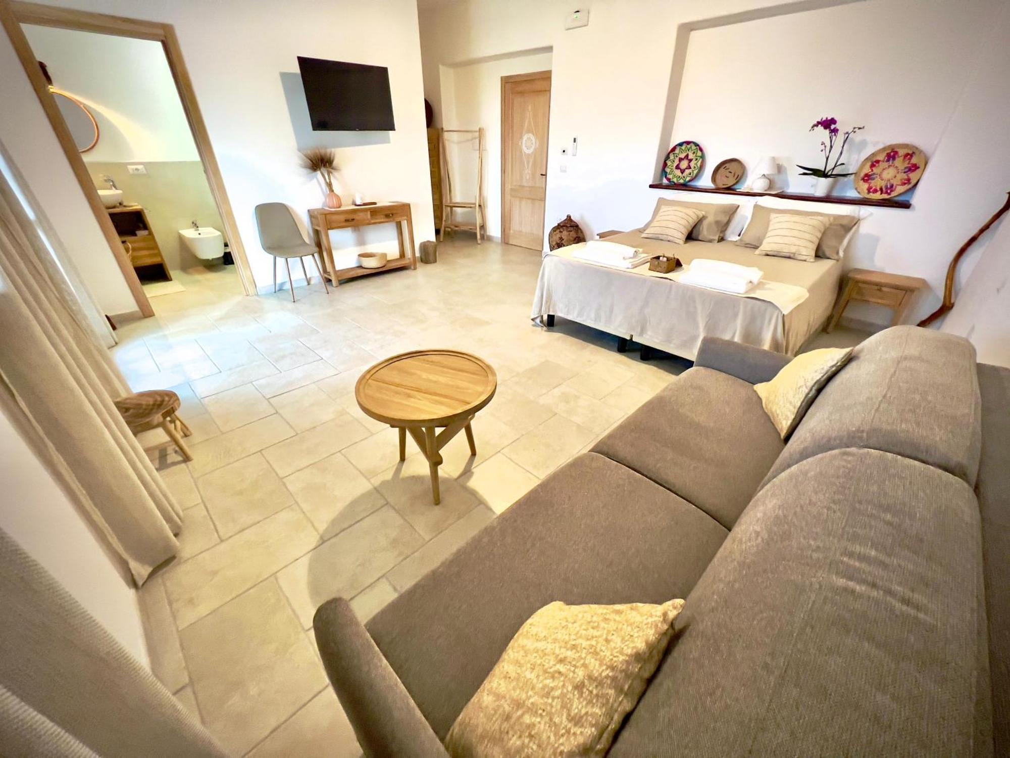 Domus La Roccia Hotel Pozzomaggiore ภายนอก รูปภาพ