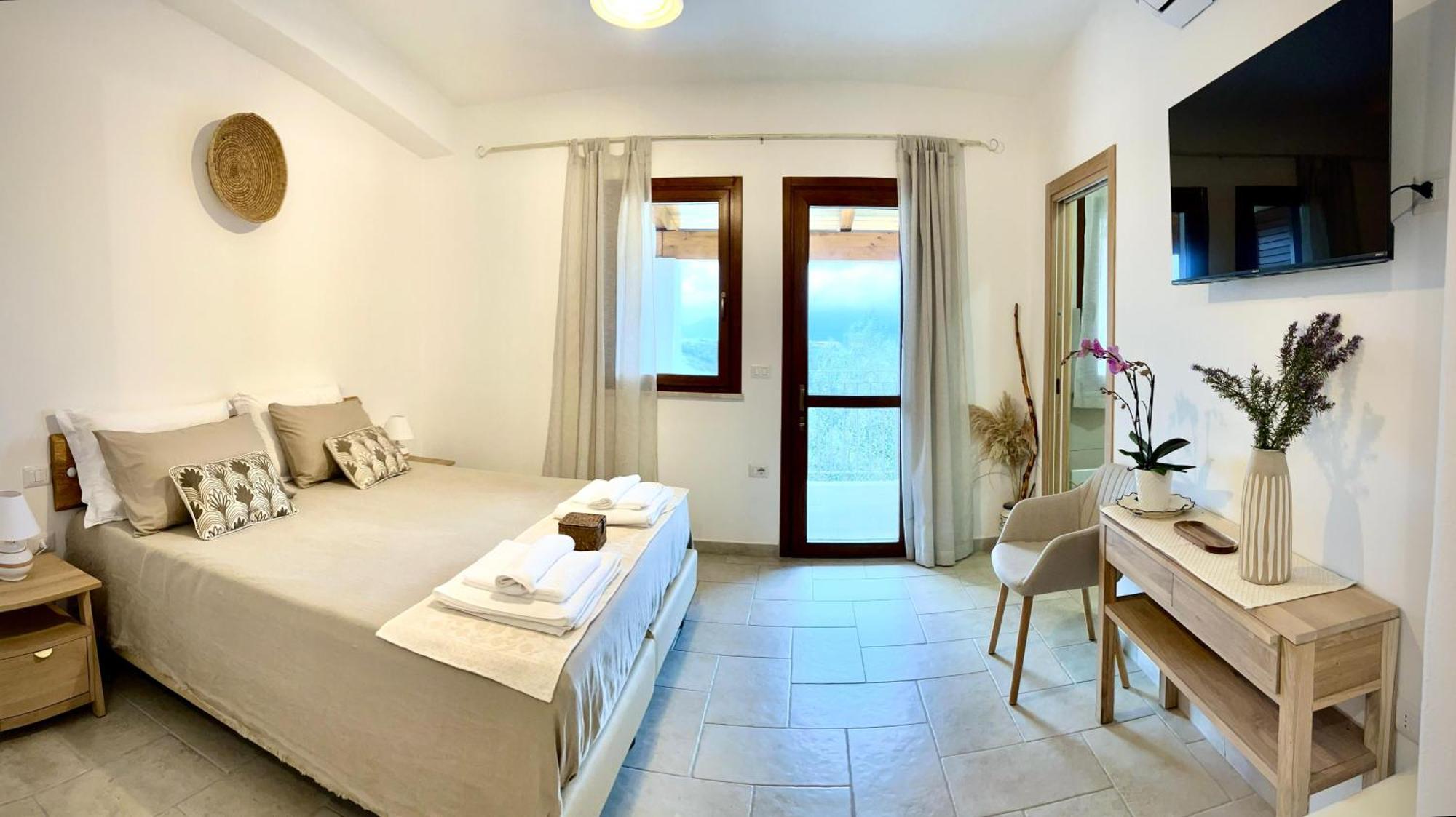 Domus La Roccia Hotel Pozzomaggiore ภายนอก รูปภาพ
